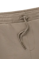 BOSS - Stretch-cotton tracksuit bottoms with embossed logo Light Green