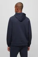 Cotton-piqué relaxed-fit hoodie with logo artwork