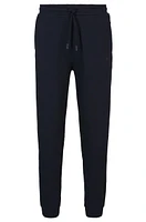 Cotton-piqué tracksuit bottoms with logo detail