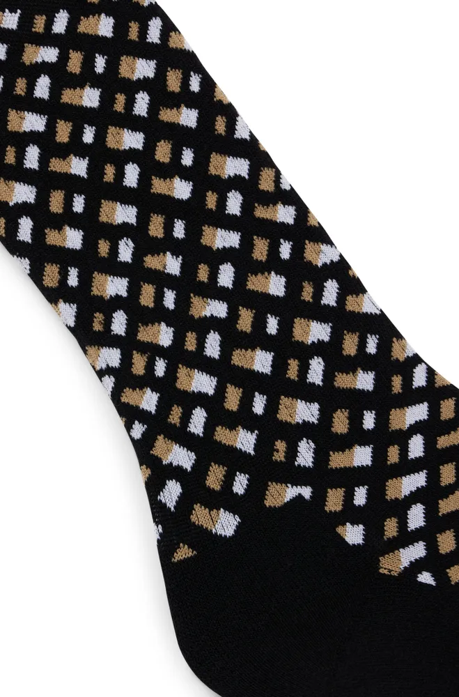 Regular-length socks with a monogram pattern