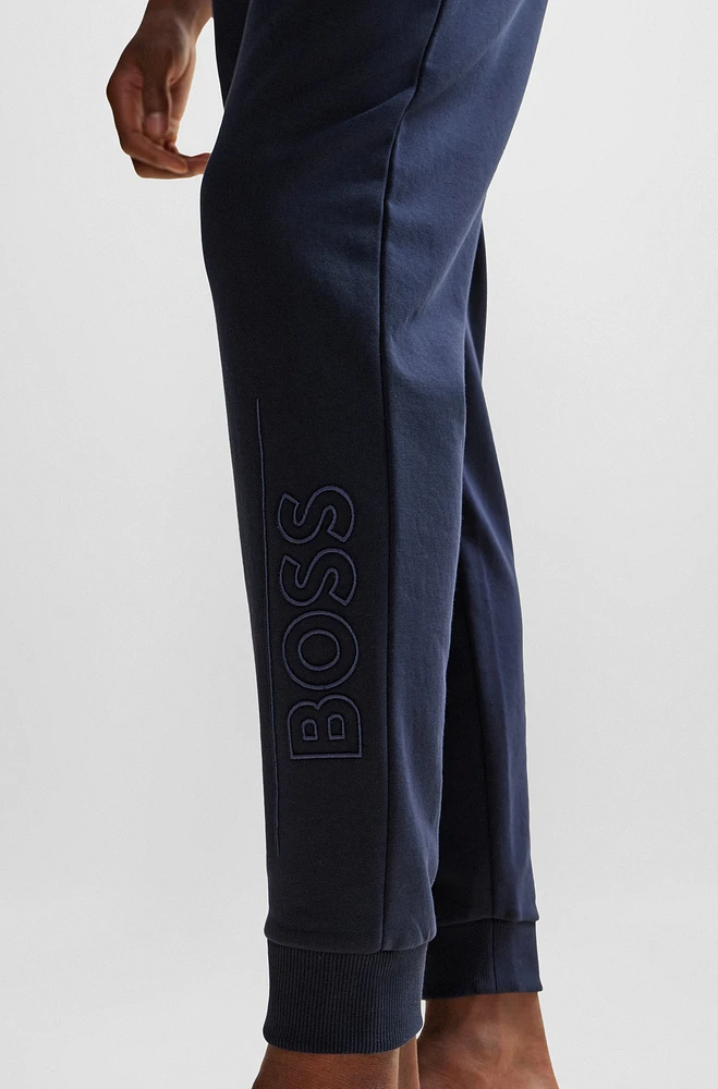 Pantalones de chándal en felpa algodón con logo bordado