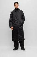 Coated-jacquard coat with concealed placket and cotton lining