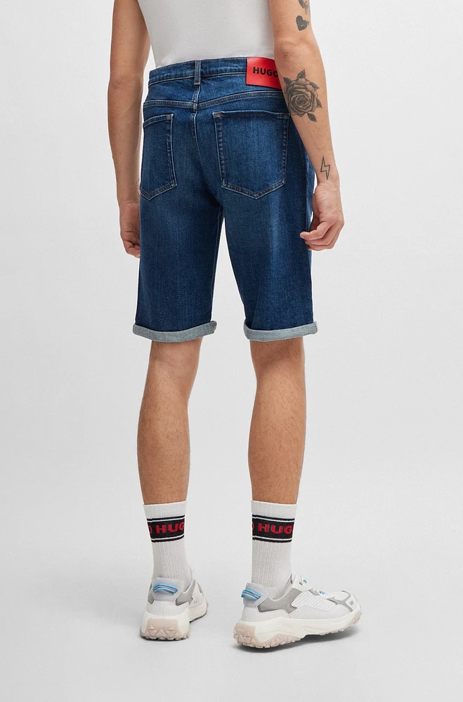 Shorts tapered fit en denim elástico azul muy cómodo