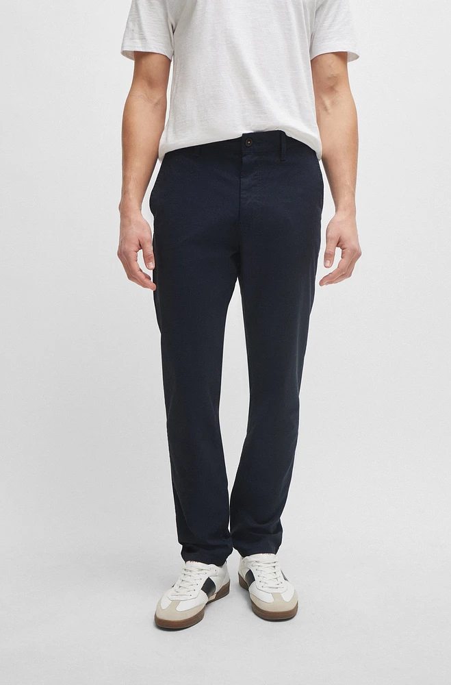 Pantalones tapered fit confeccionados en algodón estructurado