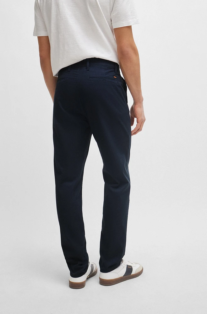 Pantalones tapered fit confeccionados en algodón estructurado