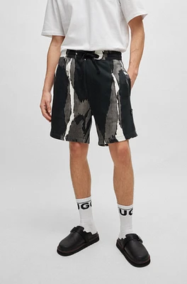 Cotton-terry shorts with camouflage print