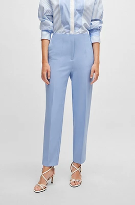 Relaxed-fit trousers with a tapered leg