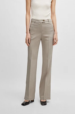 Slim-fit trousers with flared leg stretch material