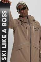 Chaqueta de esquí BOSS x Perfect Moment plumón con capucha y detalle especial la marca