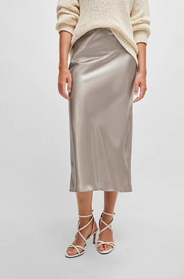 Liquid-fabric maxi skirt with diagonal seam detail