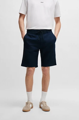 Shorts tapered fit en mezcla de lino