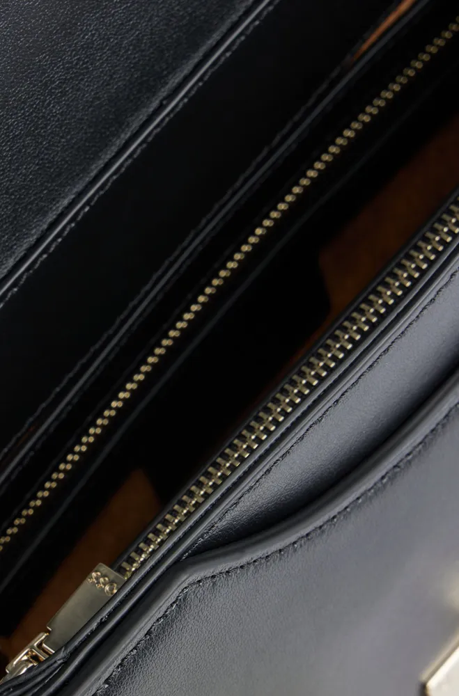 Leather shoulder bag with monogram pattern