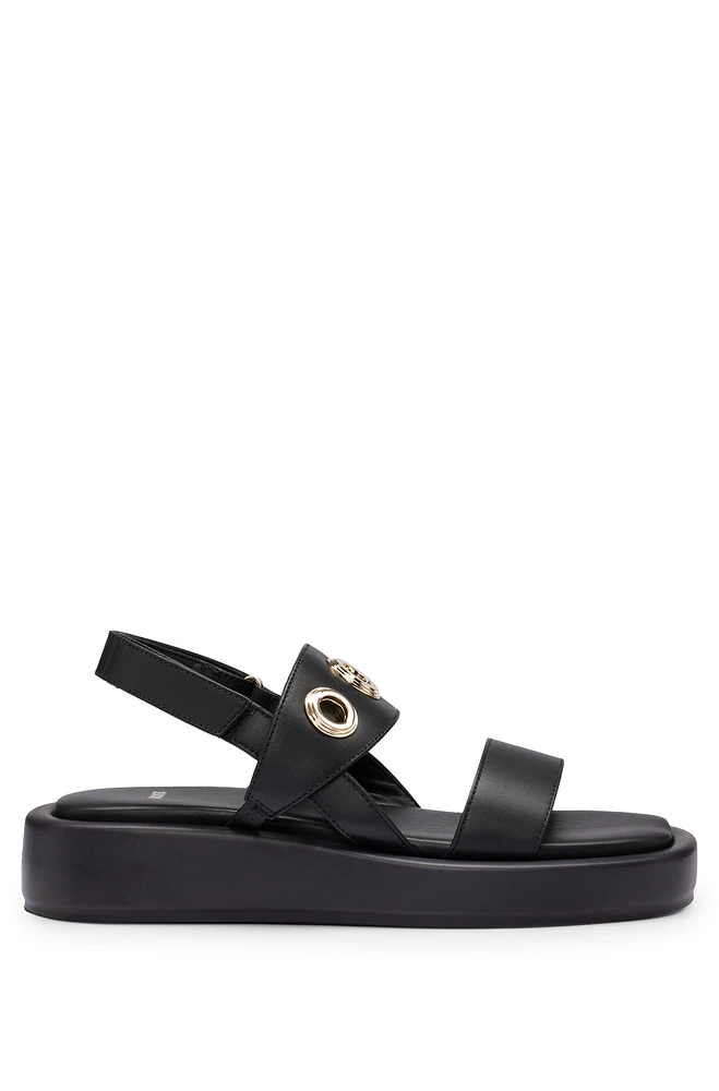 Leather sandals with eyelet details
