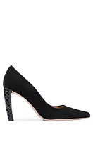 Suede pumps with monogram-structured heel