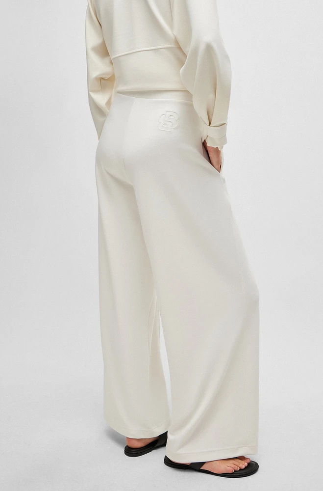 Piqué jersey trousers with front pleats