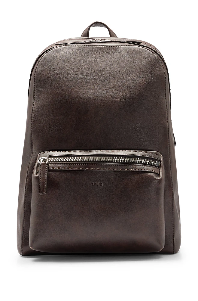 Leather backpack with embossed logo