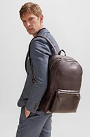 Leather backpack with embossed logo