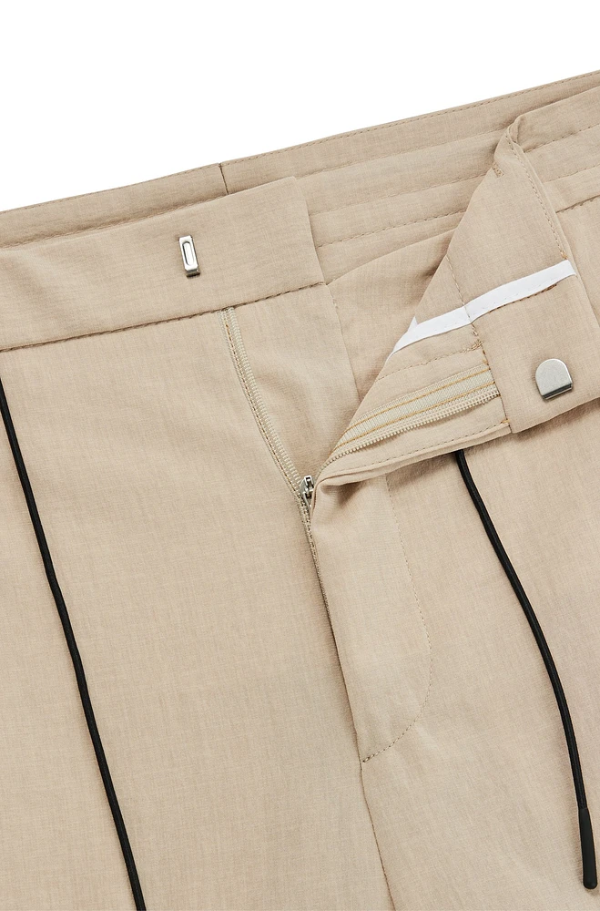 Pantalones de corte moderno en material con apariencia lino