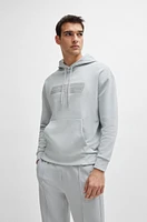 Relaxed-fit hoodie with logo artwork