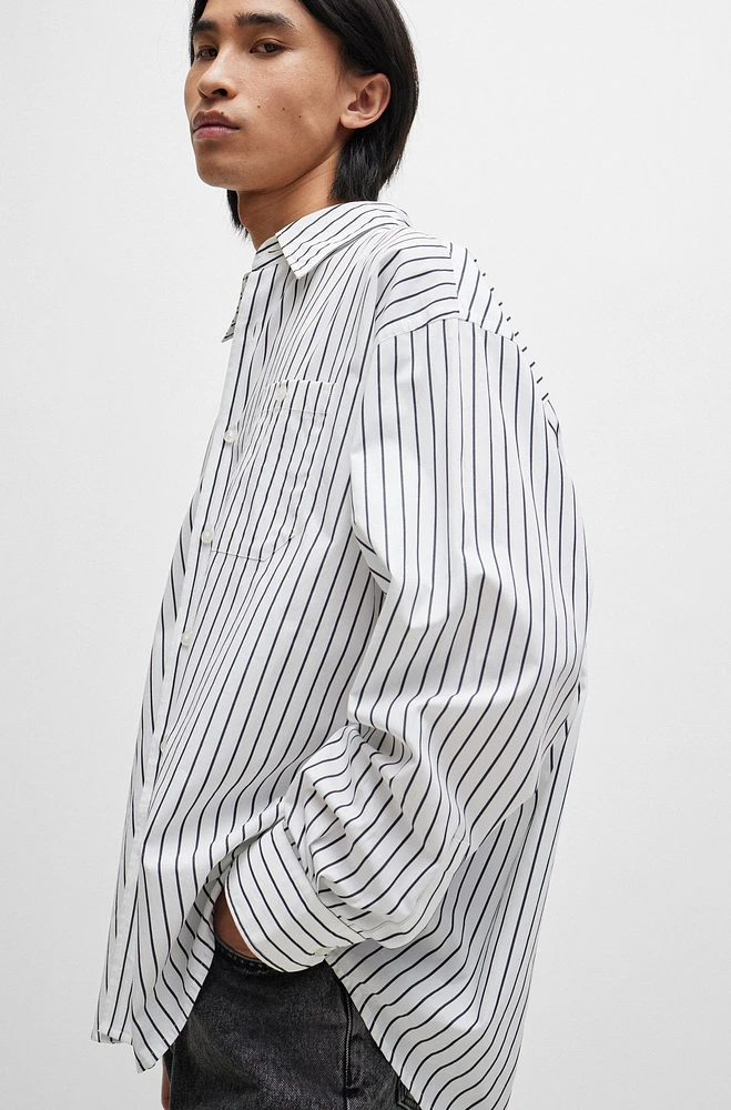 Camisa oversize fit en popelín de algodón a rayas