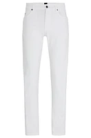 Vaqueros slim fit de denim blanco con tacto cashmere