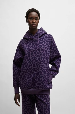 NAOMI x BOSS longline hoodie with leopard pattern