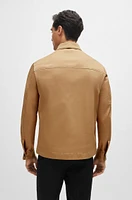 Chaqueta relaxed fit de algodón elástico con botones automáticos