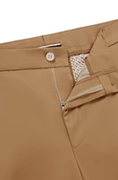 Pantalones relaxed fit de algodón elástico con cierre botón