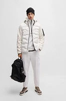 Mixed-material jacket with quilted front