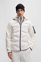 Mixed-material jacket with quilted front