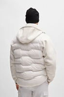 Mixed-material jacket with quilted front