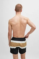 Quick-dry swim shorts with block stripes