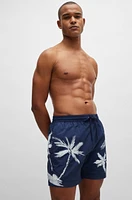 Quick-dry swim shorts with seasonal pattern