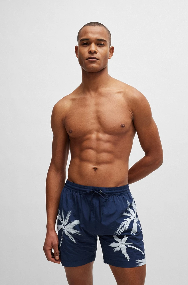 Quick-dry swim shorts with seasonal pattern