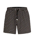 Fully lined quick-dry swim shorts with monogram print