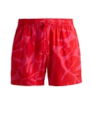 Quick-dry swim shorts with seasonal pattern