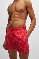 Quick-dry swim shorts with seasonal pattern