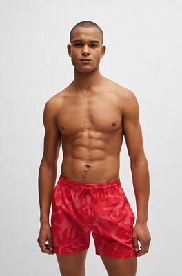 Quick-dry swim shorts with seasonal pattern