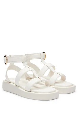 Platform leather sandals with branded buckle closure