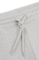 Pantalones de chándal loose fit en felpa algodón con logo contorno