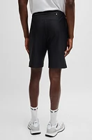 Quick-dry shorts with decorative reflective logo