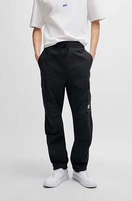 Relaxed-fit cargo trousers structured cotton