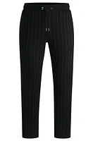 Porsche x BOSS tracksuit bottoms with vertical stripes