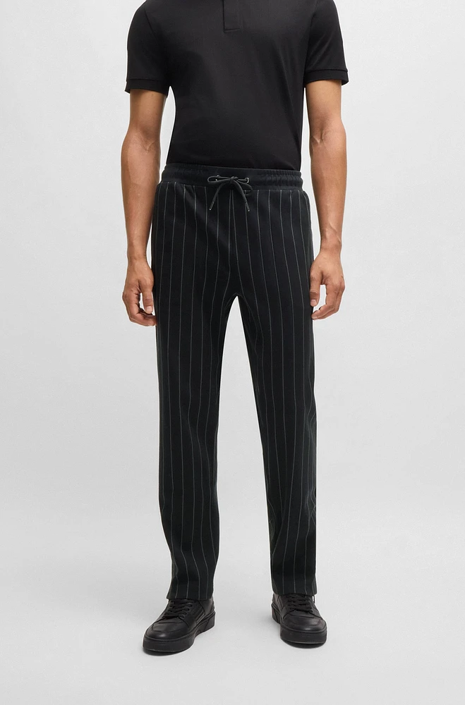 Porsche x BOSS tracksuit bottoms with vertical stripes