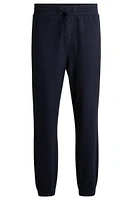 Regular-fit tracksuit bottoms performance fabric