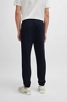 Regular-fit tracksuit bottoms performance fabric