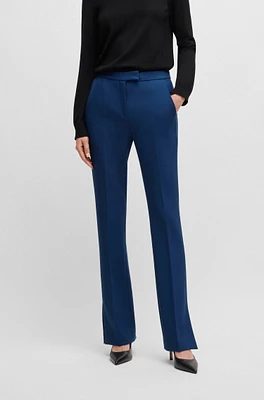 High-waisted trousers with flared leg