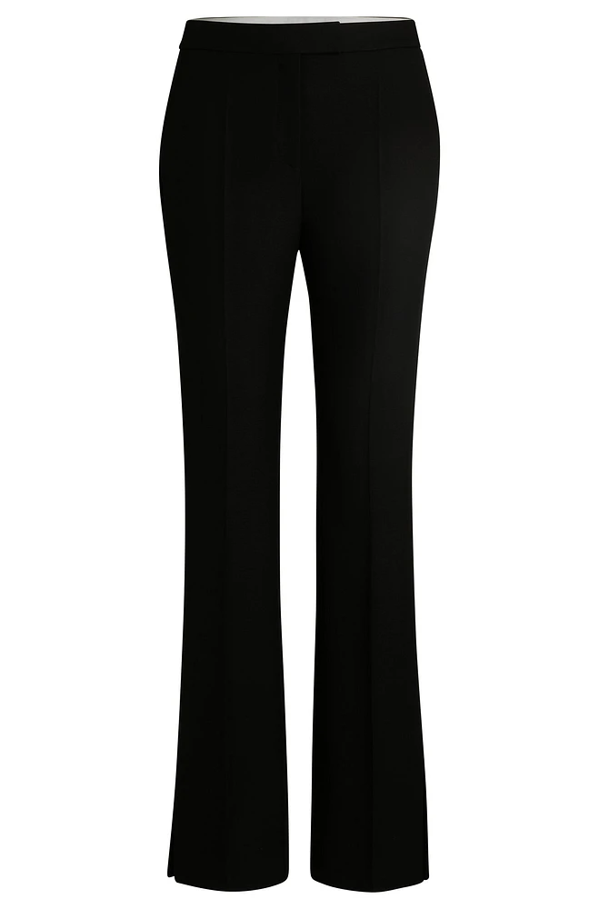 High-waisted slim-fit trousers with flared leg