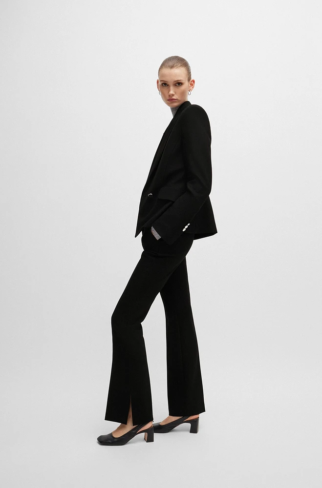 High-waisted slim-fit trousers with flared leg