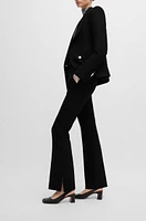 High-waisted slim-fit trousers with flared leg